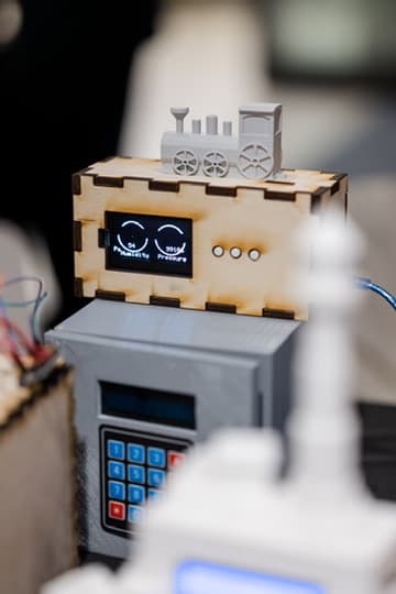 Student builds with screens, keypads and laser-cut cases on display